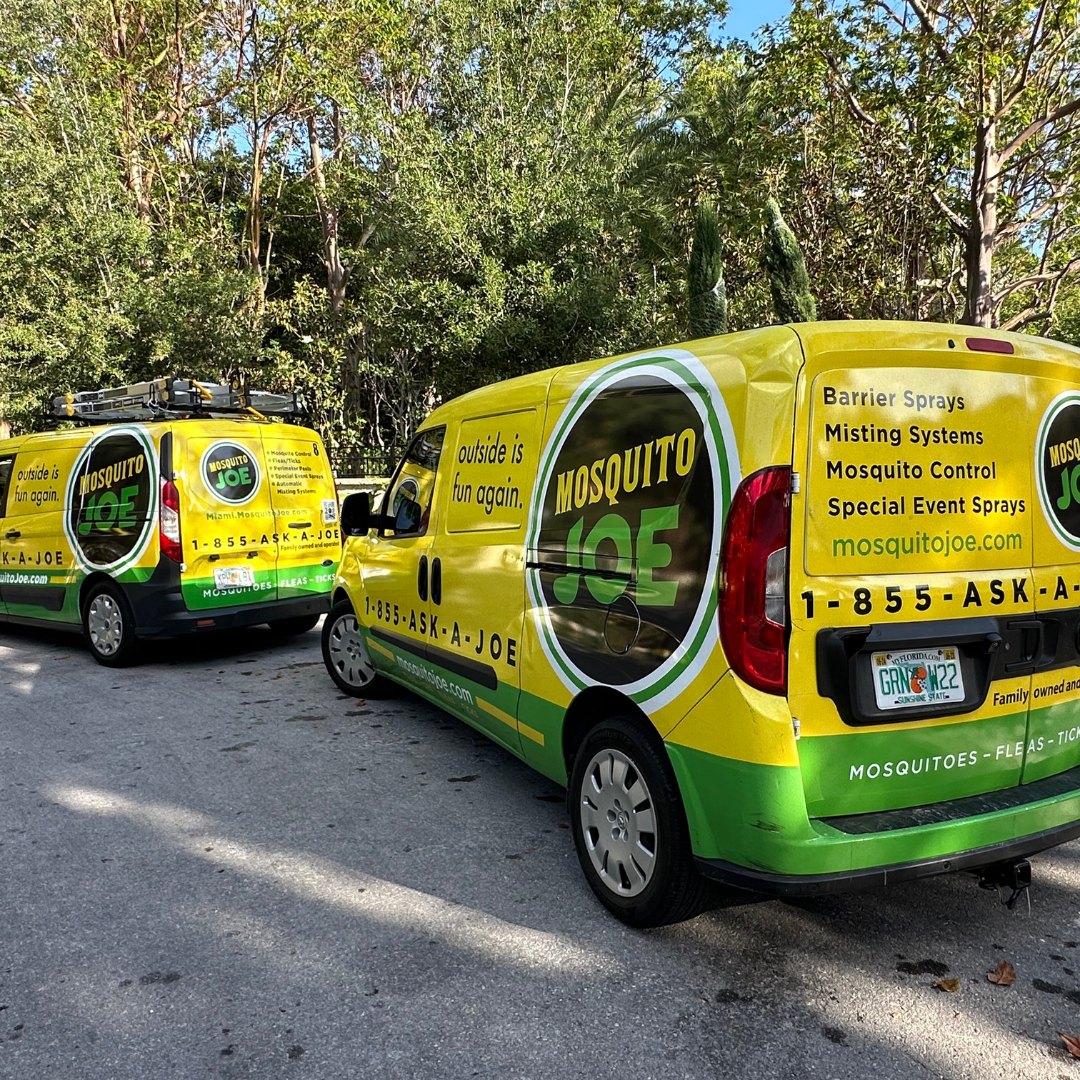 A branded Mosquito Joe van on a Miami street
