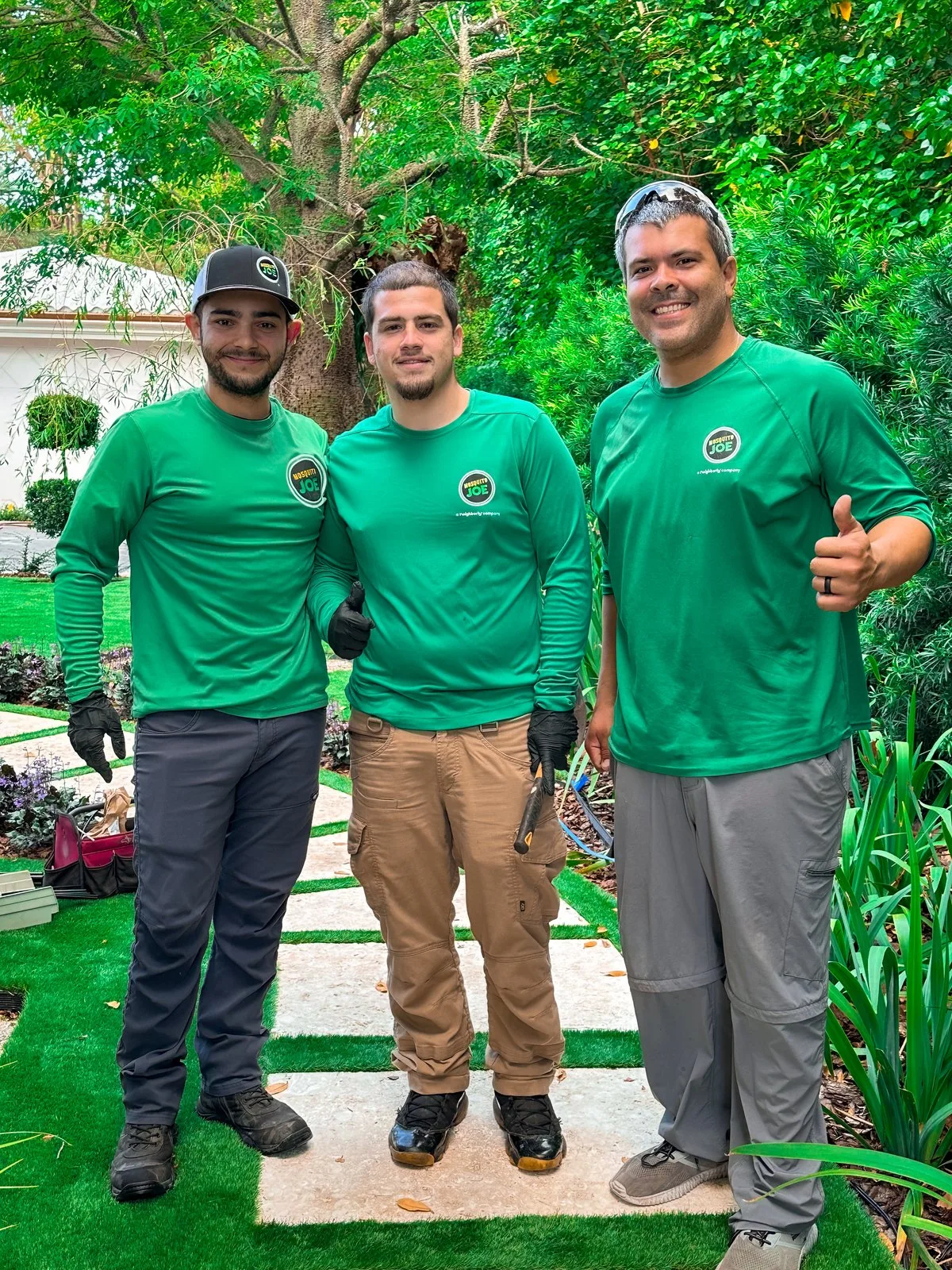 Three Mosquito Joe of Miami team members